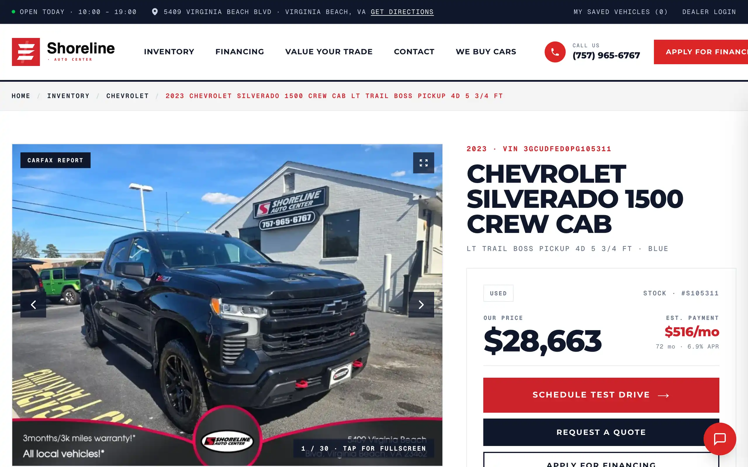 A car page on shorelineautocenter.com: photos, price, mileage and the buttons to ask about it