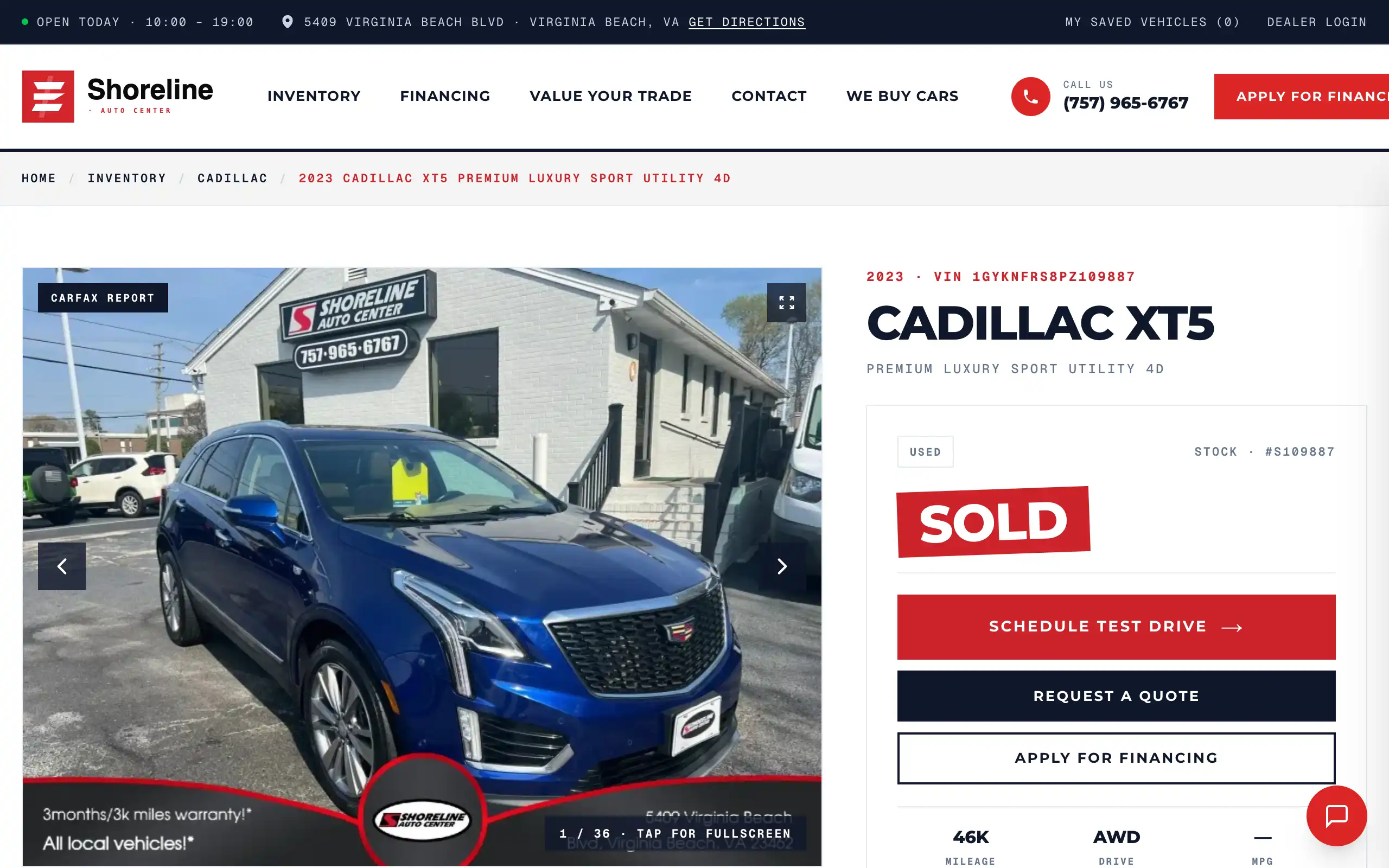 A sold 2023 Cadillac XT5 on shorelineautocenter.com, with the SOLD marker where the price was